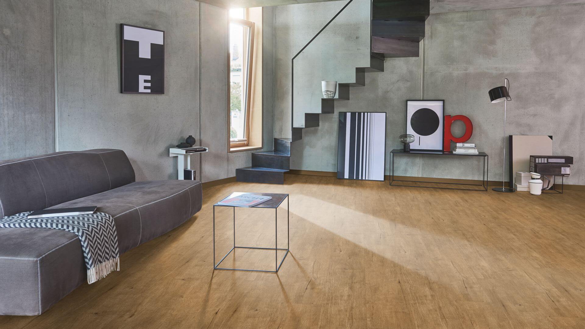 直線の家具をメインに、ソファや照明・アートで曲線を加えたコーディネート例